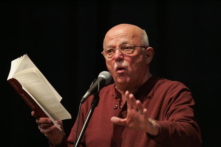 portrait of david budbill in a reading performance